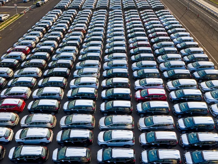 Aerial view of finished vehicles lined up for delivery
